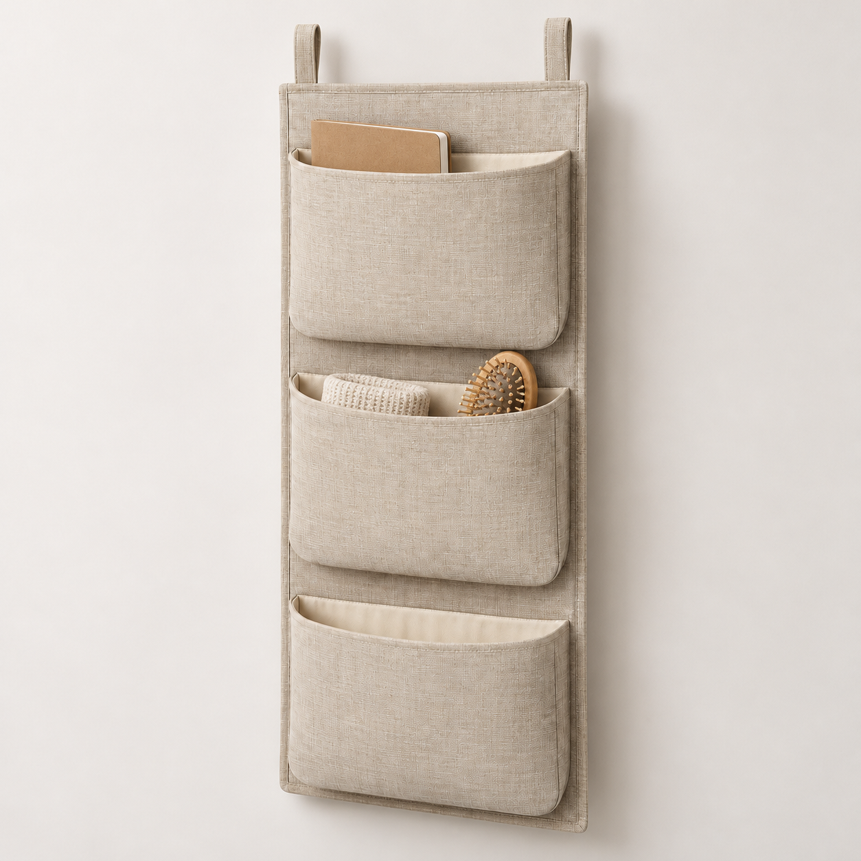Natural Oat 3-Pocket Hanging Storage Organiser showing pocket openings and hanging structure