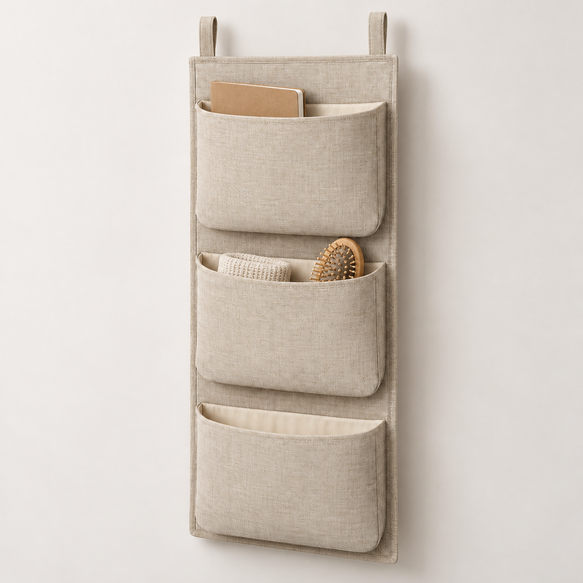 Natural Oat 3-Pocket Hanging Storage Organiser showing pocket openings and hanging structure