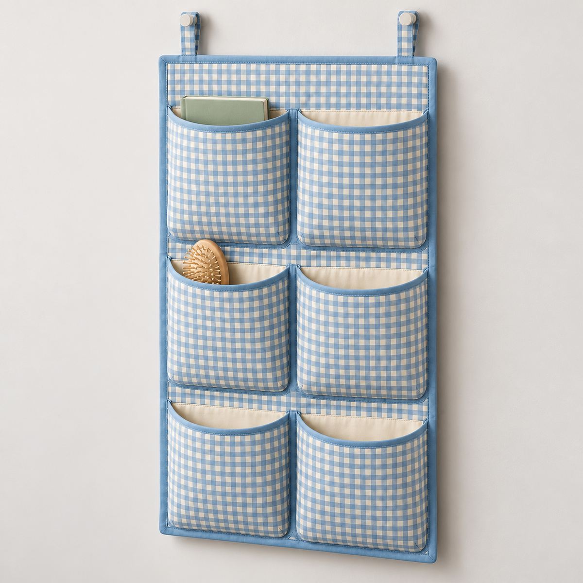 Blue Gingham 6-Pocket Hanging Storage Organiser showing pocket openings and hanging structure