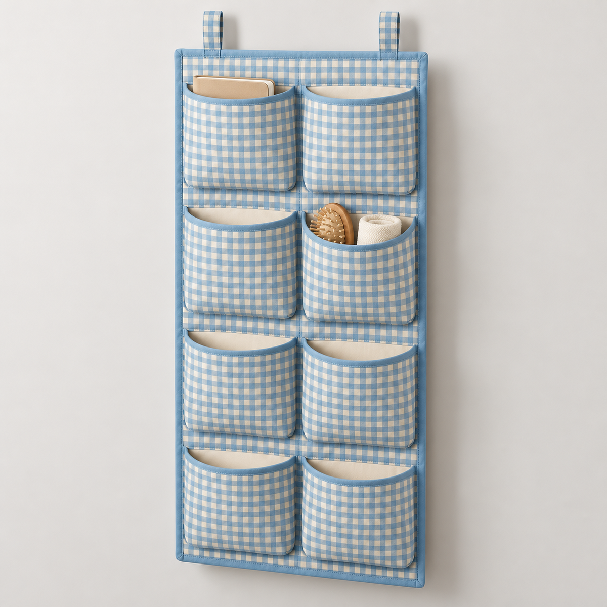 Blue Gingham 8-Pocket Hanging Storage Organiser showing pocket openings and hanging structure